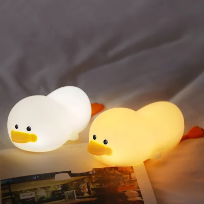 Lampada notturna in morbido silicone alimentare Gg Duck con sensore tattile e luce colorata